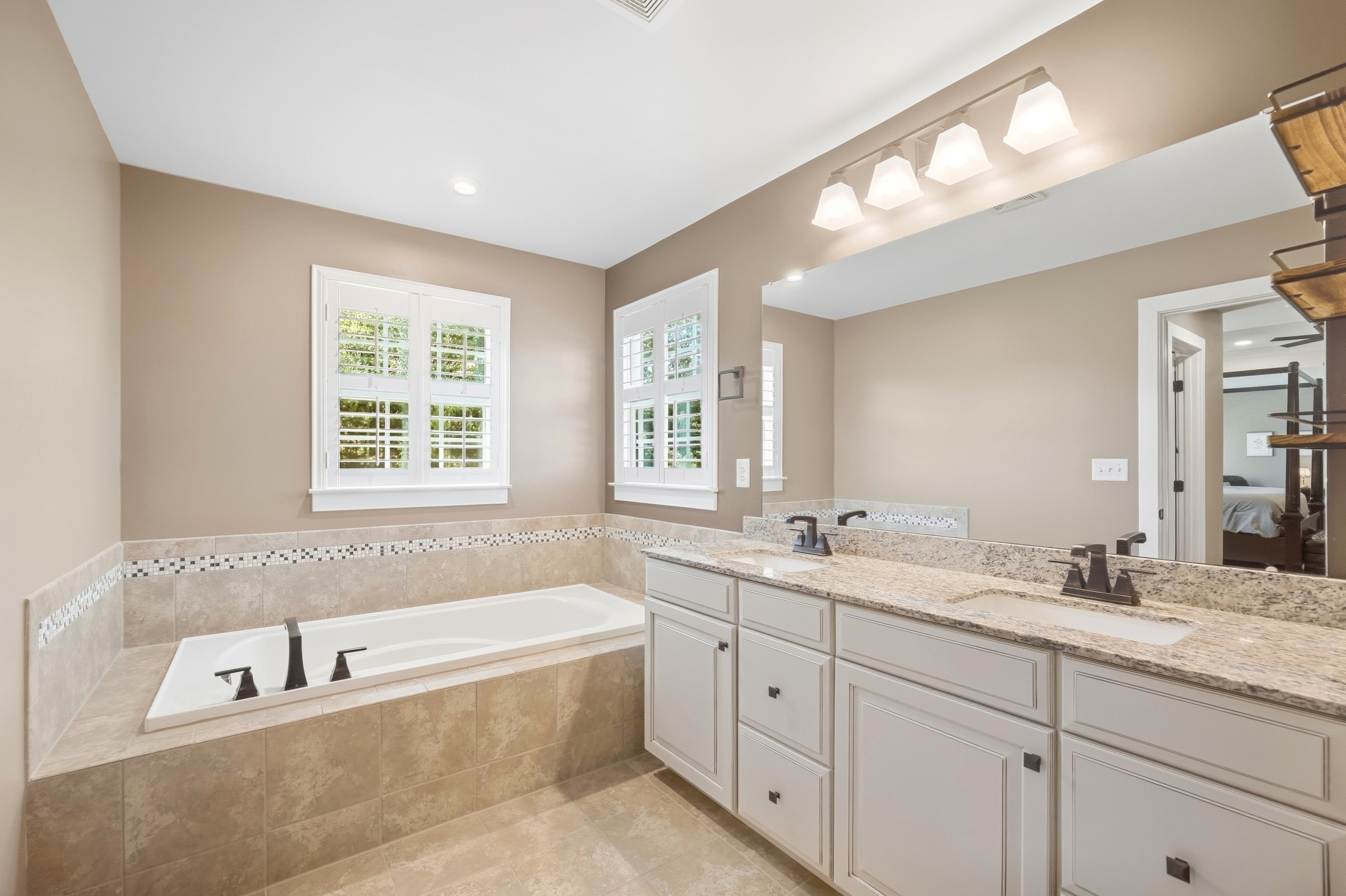 Primary bath — soaking tub & dual vanity