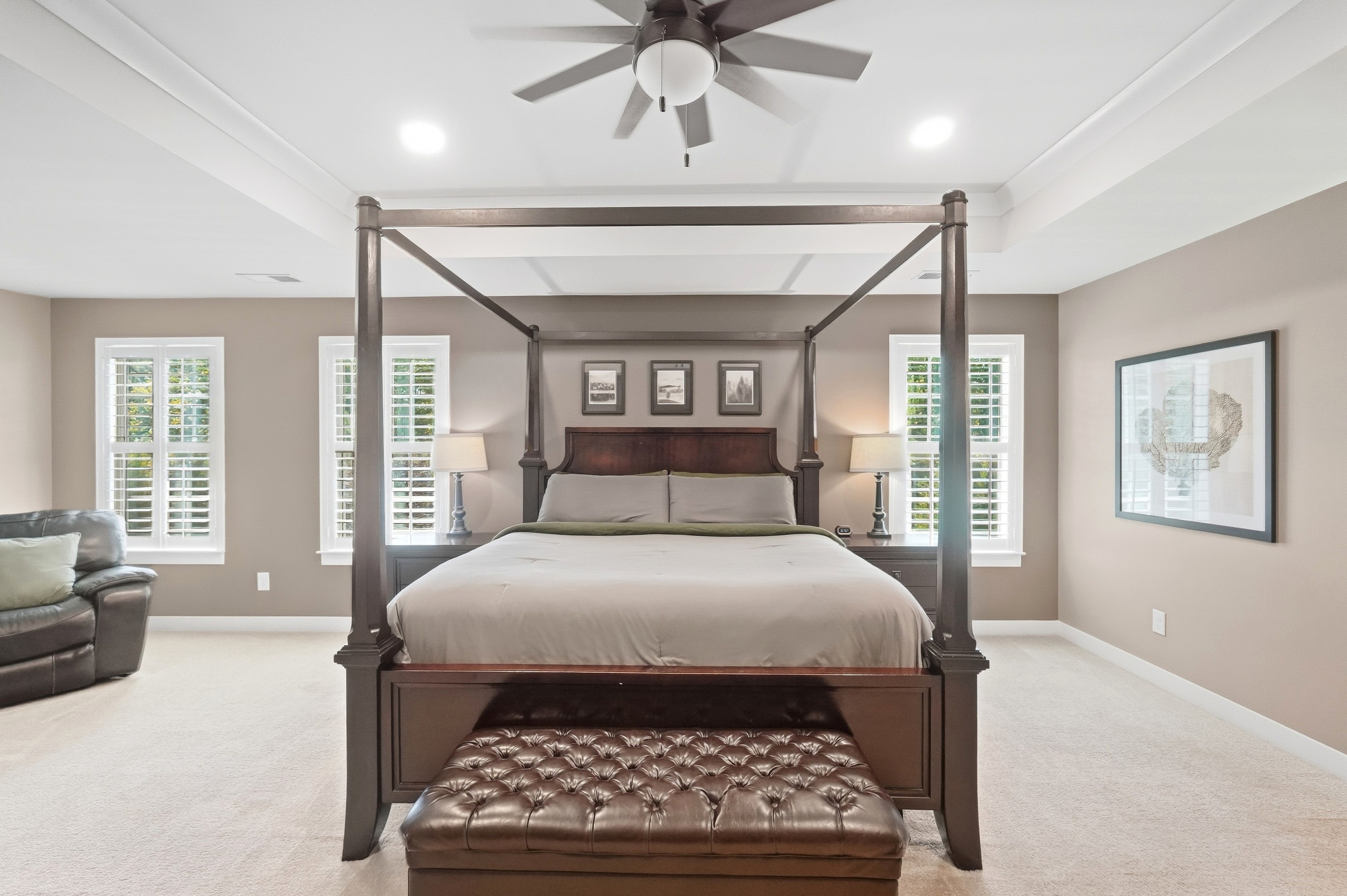 Primary bedroom — four-poster bed
