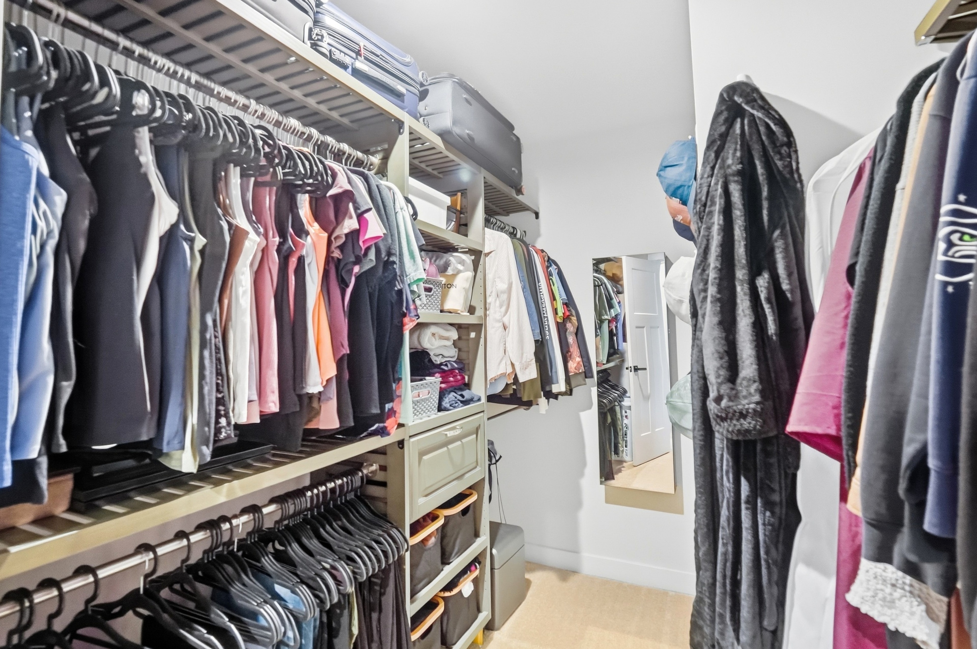 Primary suite — her closet