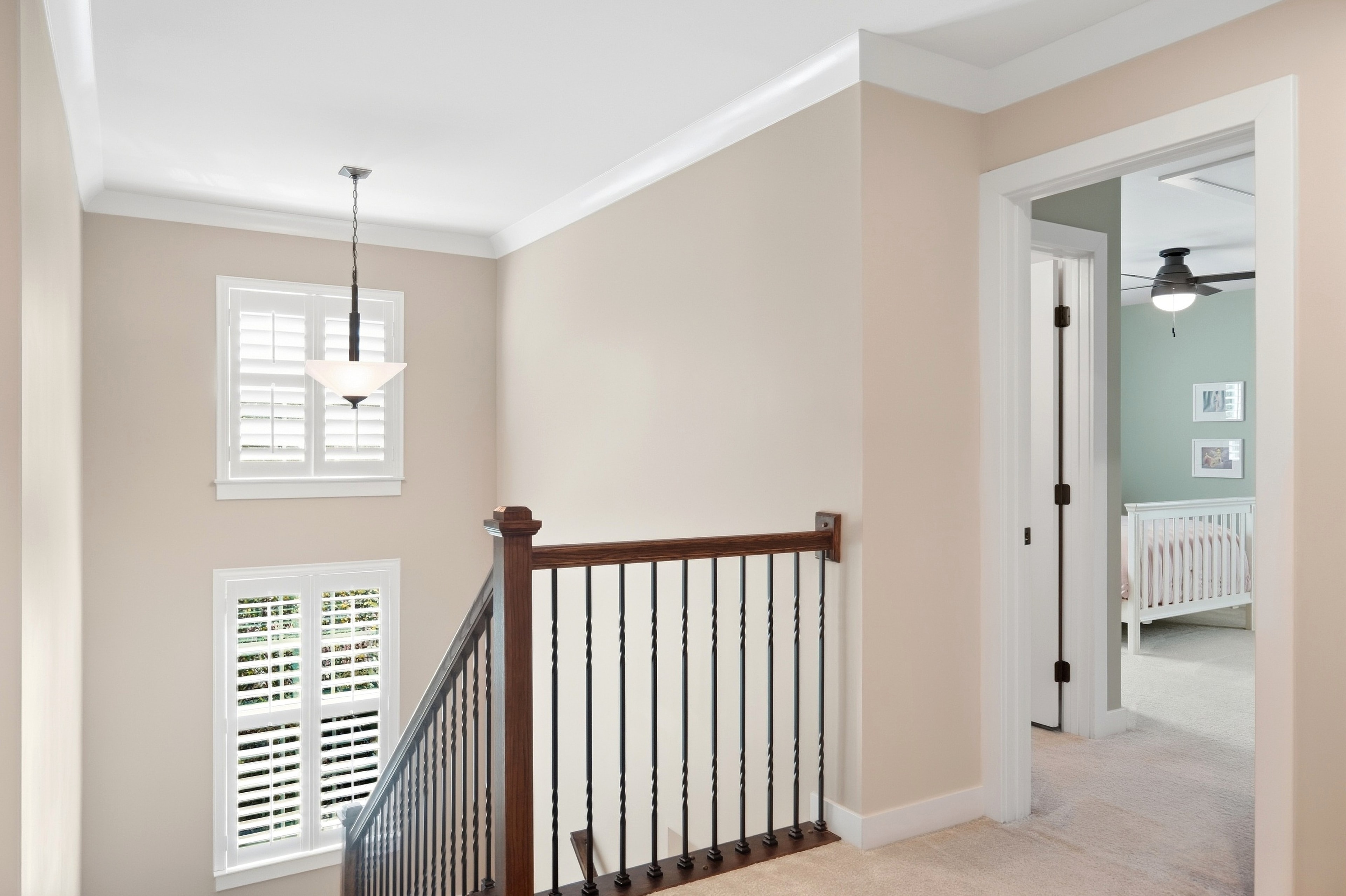 Upper landing with pendant light & bedroom views